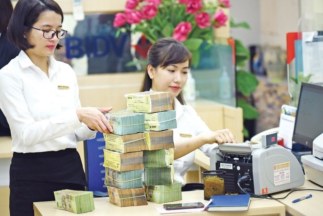 Tin ngân hàng ngày 26/12: Các ngân hàng mua lại hơn 26.000 tỷ đồng trái phiếu trước hạn