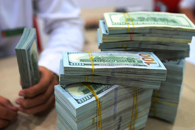 Tỷ giá ngoại tệ hôm nay 5/1: Tỷ giá USD Ngân hàng Nhà nước và thế giới đồng loạt giảm